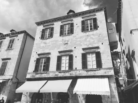 Stradun, Stradone is the main street of the historic city center of Dubrovnik in Croatia. architectural sights. A popular place for tourist walks. August 14, 2022 Black and white.