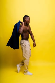 African American millennial businessman isolated on a studio background, successful male formal suit