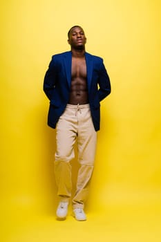 African American millennial businessman isolated on a studio background, successful male formal suit