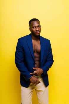 African American millennial businessman isolated on a studio background, successful male formal suit
