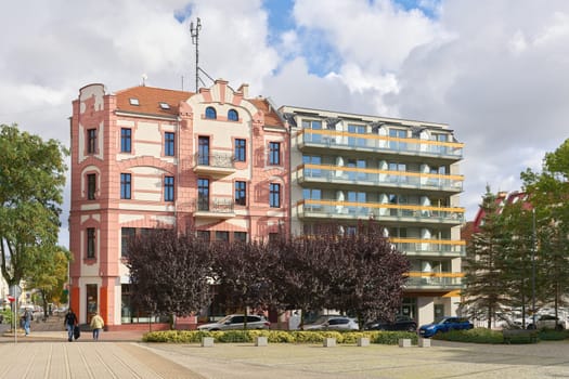 Old and modern architecture side by side in the city center of Swinoujscie in Poland