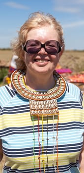 Portrait of woman wearing traditional handmade accessories, Kenya. africa