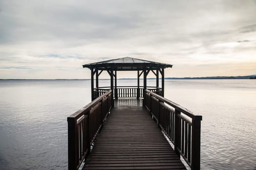 wooden gazebo, receding into the distance - Lake Garda Italy