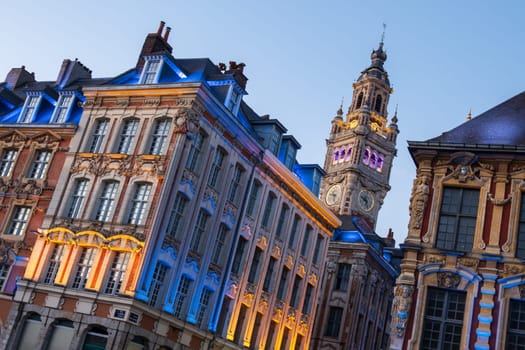Antique renaissance buildings and the belfry of the Chamber of Commerce in Lille, France
