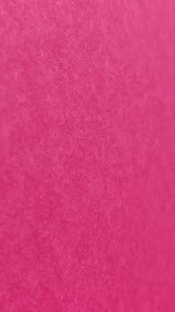 Beautiful fuchsia bright background. Scarlet, purple, uneven color. A sheet of colored paper with a soft fleecy texture