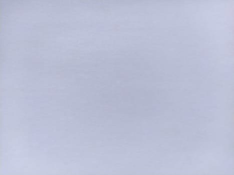 White sheet of paper with pulp texture. Light lilac shade.
