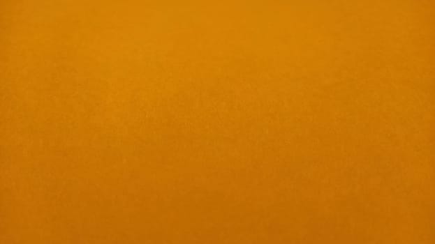 Orange background. Banner. Orange paper sheet with texture.