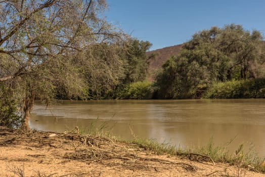 Landscape on the banks of the Kunene River, the border river between Namibia and Angola