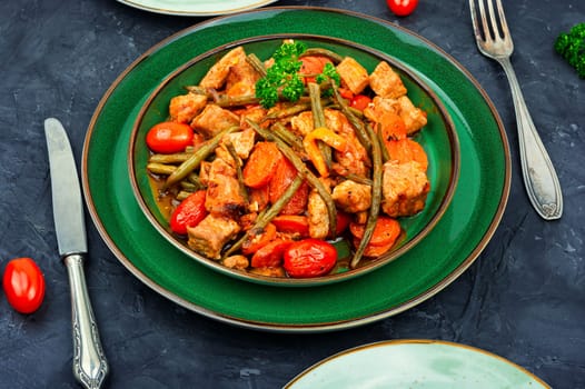 Stewed meat with carrots,tomatoes and french bean.Meat sauce with green beans.