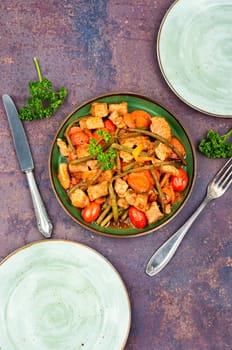 Stewed meat with carrots,tomatoes and french bean.Meat sauce with green beans.