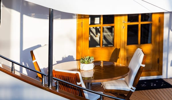 Luxury yacht. Comfortable expensive wooden design and furniture for holiday recreation tourism or travel and wealth concept