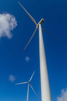 Wind turbine on blue sky in nature. Galiza, North of Spain