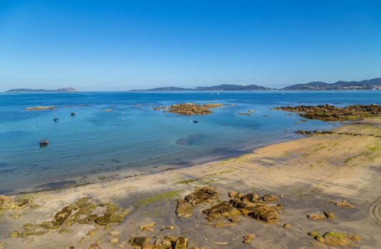 Vigo, Spain - July 27, 2022: People in Samil beach in a summer day, Vigo. Spain