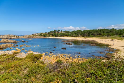 Galicia, Spain - July 27, 2022: People in Galicia beach in a summer day, Galicia. Spain