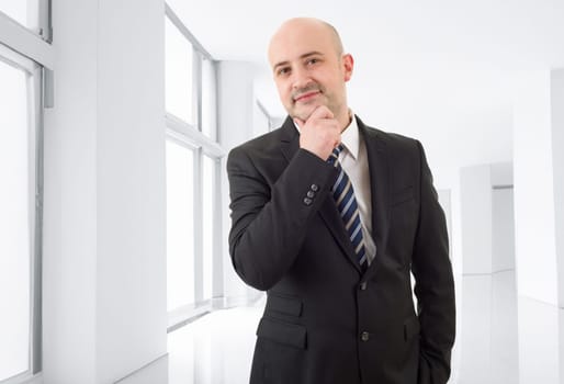 happy business man portrait at the office