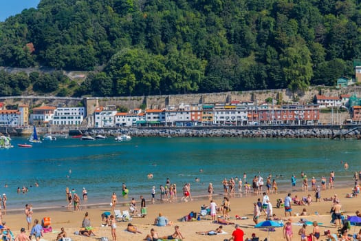 San Sebastian, Basque Country, Spain: August, 20, 2022: Landscape of La Concha beach in the city of San Sebastian, in the Spanish Basque Country