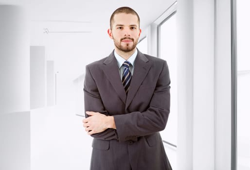 young business man portrait at the office