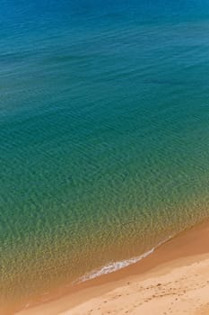 Turquoise water on the uncrowded beaches of Sagres in Algarve, Portugal