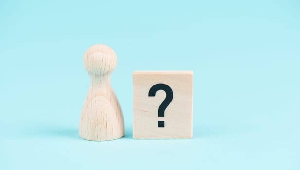 Man with a question mark, education and business concept, searching for answers, thoughts for solving a problem, having doubts