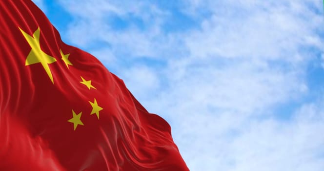 The flag of China waving on a sunny day. Red background, five yellow stars. The largest star symbolizes the guidance of the Chinese Communist Party. 3D illustration render. Rippled fabric