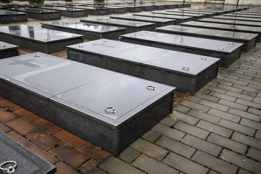 Detail of modern tombs in a Catholic cemetery in a city in Spain
