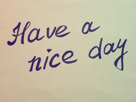 Have a nice day. Phrase or lettering. Black handwritten words. Multicolored background in retro or vintage style. Background burnt out in the light. Good day wishes or goodbye greetings. Postcard.