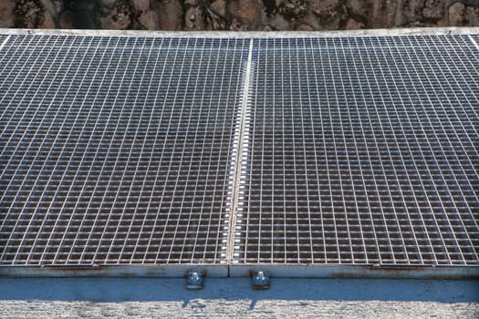 Galvanized steel floor grille. Selective focus