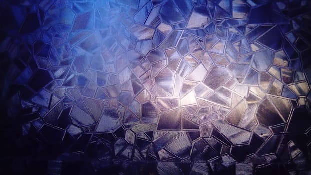 Light through the glass. Corrugated glass refracts the rays of the early morning sun. Winter frosty patterns. Violet, blue, pink colors and transitions from one to another color.