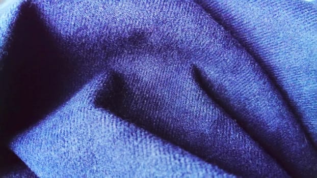 Dark blue fabric that looks like velvet or velveteen. Broken waves