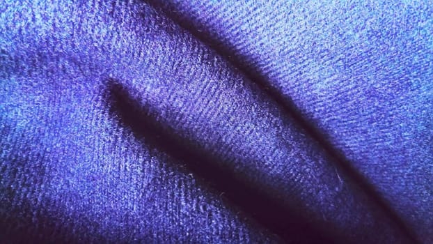 Dark blue fabric that looks like velvet or velveteen. Broken waves