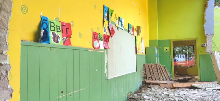 Sremska Mitrovica, Serbia, 13 August 2020. Dismantling and demolition of the old school named after Jovan Popovic. Holes in the walls and ceiling. Ruined classroom.