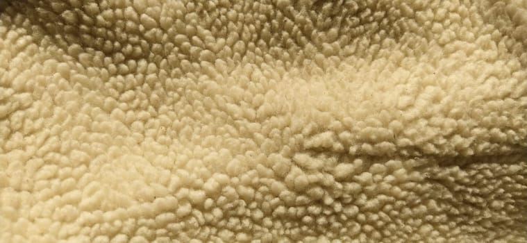 Sheepskin, sheep fur. The inner side of a coat or jacket, trimmed with natural or artificial sheep fur. Karakul as an element of winter outerwear