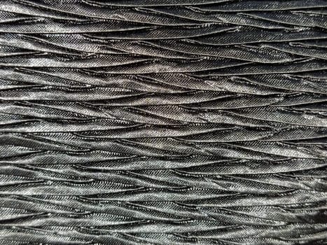 black fabric background.Abstract black woven background. Silk or satin.