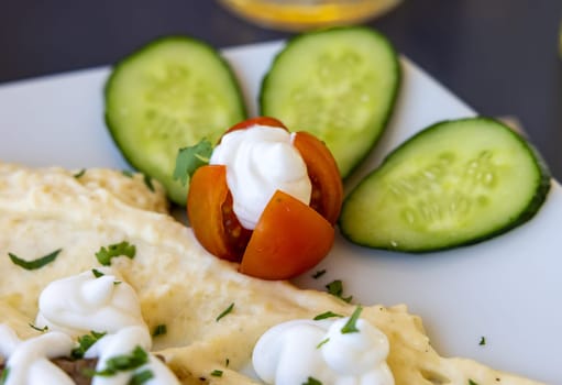 Healthy vegetable appetizer with cucumbers and tomato