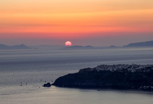 Sunset over Santorini as seen from Imerovigli. Cyclades, Greece