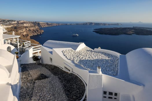 Panoramic view of the Santorini caldera cliffs from the Imerovigli village on Santorini island, Greece