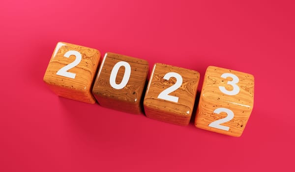 Flipping wooden cubes with the Year number 2022 and 2023 on a magenta background, New Year concept, 3d rendering