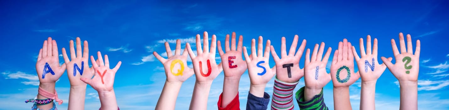 Children Hands Building Colorful English Word Any Question. Blue Sky As Background
