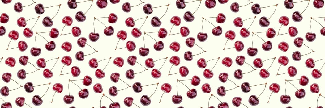 Seamless endless pattern of bright ripe red sweet cherries isolated on white background