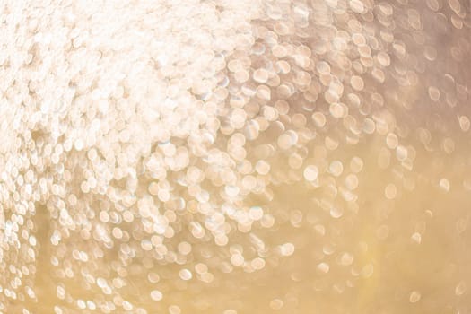 Creative background image. Light transparent drops of water in blur. Blurred bokeh on light background.