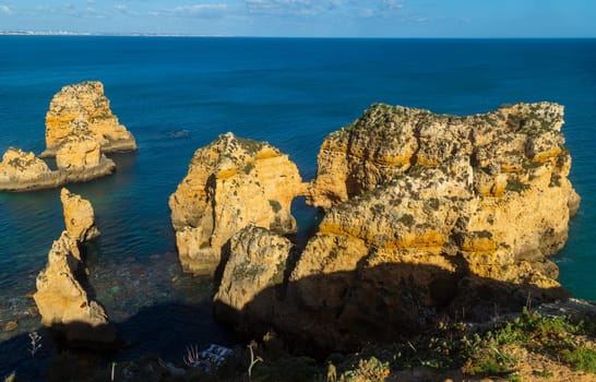 Ponta da Piedade cliffs near Lagos, Portugal. Beautiful seascape with natural rock formations in the Algarve, Portugal
