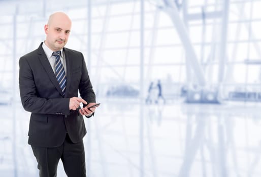 young businessman working on the phone, at the office