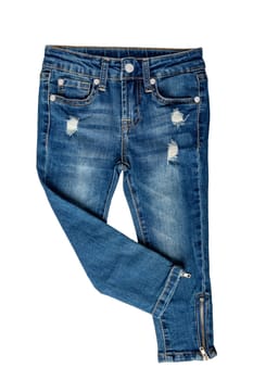 Girls jeans isolated. Elegant trendy stylish female blue jeans trousers isolated on a white background. Clipping path. Fashionable denim pants for kids.