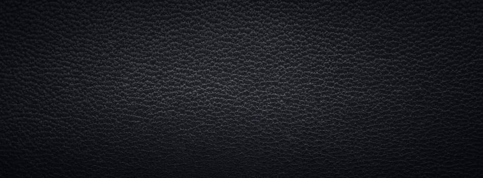 Beautiful texture of a fine black leather surface using as background or header