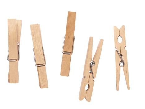 Close up of wooden clothespins on a white background, attach or hold together concept