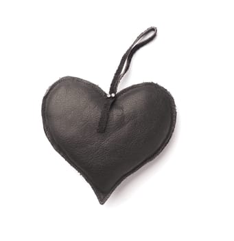 Black leather heart shape, love symbol, close up studio shot, Valentines Day or wedding object