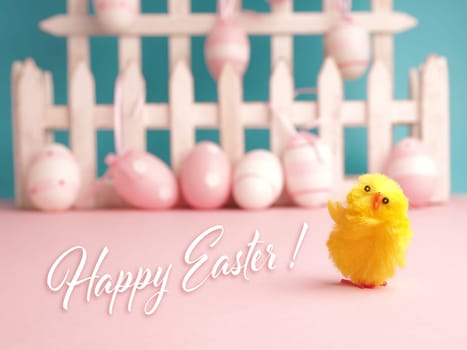 Close up of a cute chick with the words Happy Easter and an Easter egg background