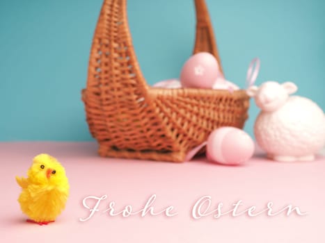 Close up of a cute chick with the German words Happy Easter and an Easter egg background