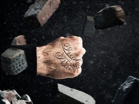 Freedom and peace tattoo on a fist punching through a stone wall. Concept for freedom and world peace and human rights.