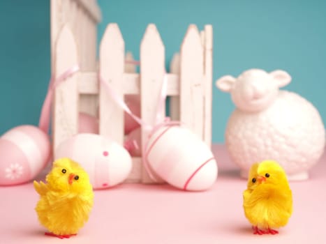 Close up of a cute chick with a sheep and an Easter egg background, Happy Easter concept, space for text